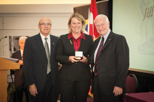 Heinerth honoured. Left, President of the Royal Canadian Geographic Society Paul  Ruest. Right, Governor General of Canada, David Johnson. Photo: Bonnie Findley